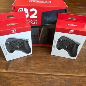 Nintendo Switch OLED with Black and Red Controllers